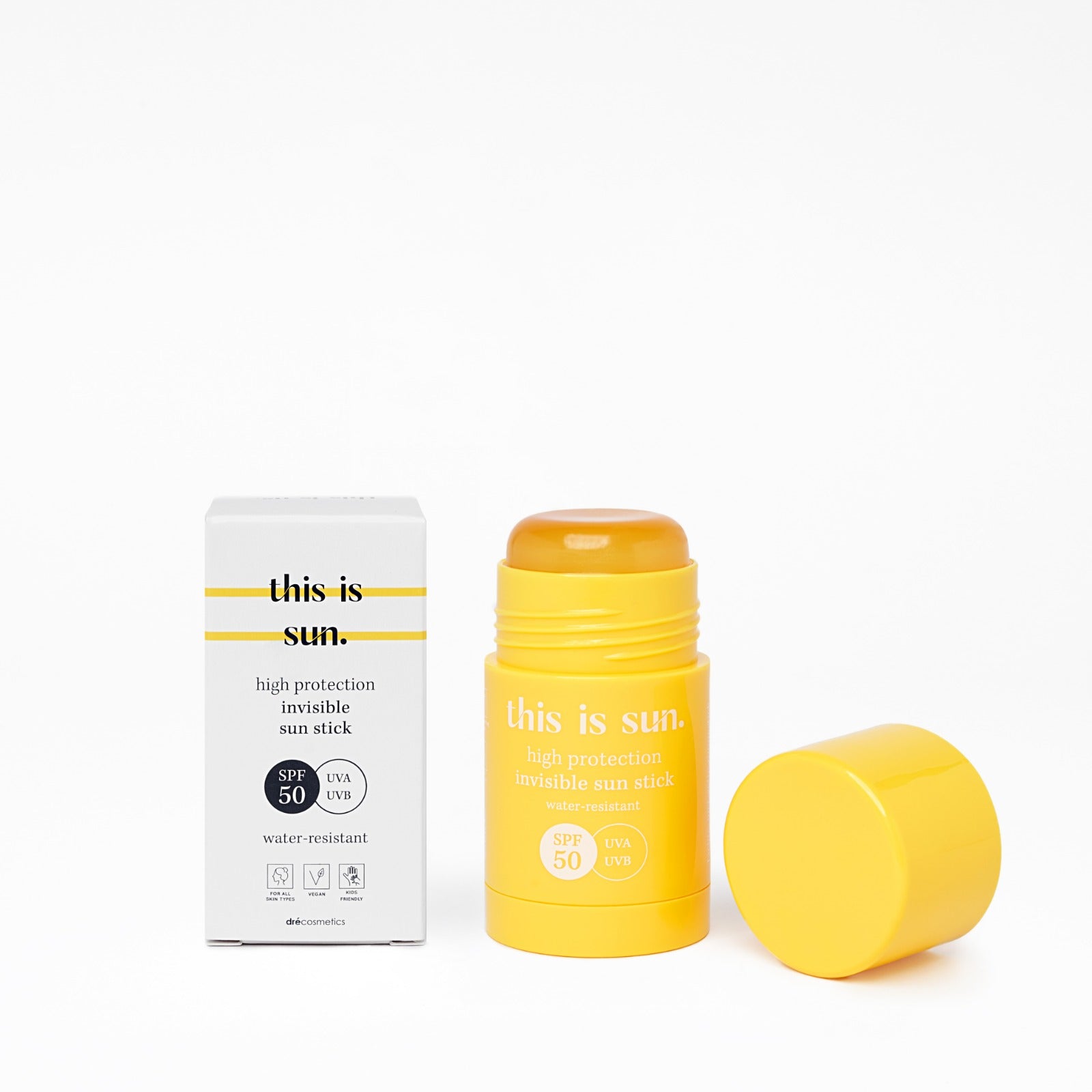 This is sun Invisible Sun Stick SPF50 met verpakking en gele sun stick voor dagelijkse zonbescherming.